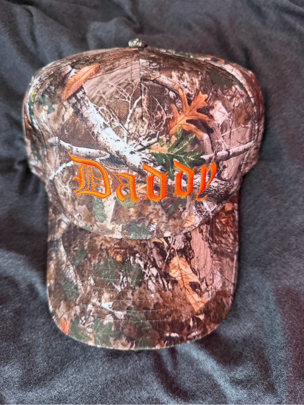 Urban Outfitters Camo 'Daddy' Cap with Orange Embroidery